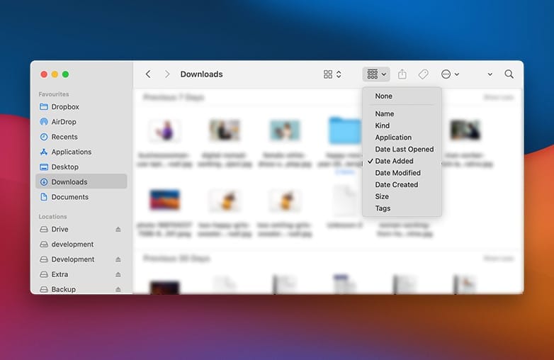 Delete large files from Downloads folder to free up disk space on Mac