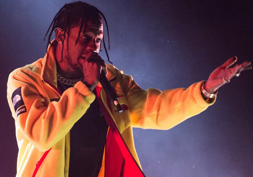 Travis Scott performing SICKO MODE on stage